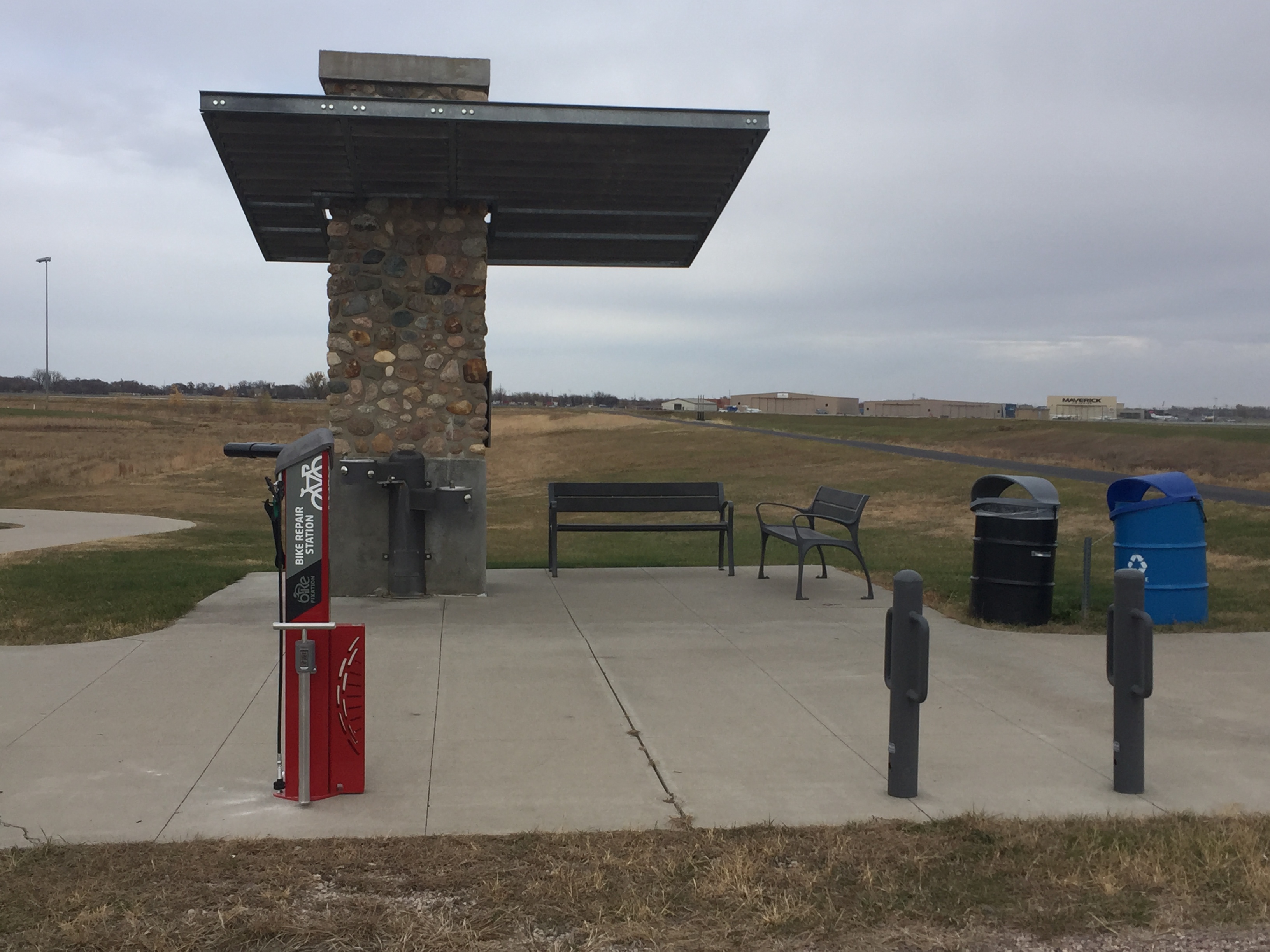 picture of a red bike maintenance station on the Sioux Falls Bike Trail.